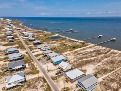Fall in love with this gorgeous beach house situated on on Isle Dauphine Club Golf Course in Alabama - for sale on GolfHomes.com, golf home, golf lot