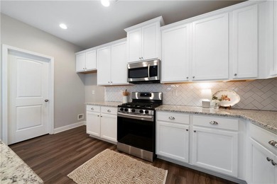 Discover life in The Georgian, one of Villa Rica's most on The Frog Golf Club in Georgia - for sale on GolfHomes.com, golf home, golf lot