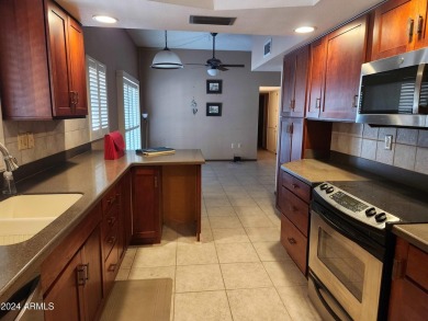 Discover the charm and potential of this exceptional 2-bedroom on PalmBrook Country Club in Arizona - for sale on GolfHomes.com, golf home, golf lot