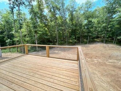 Needs paint, flooring and light deferred maintenance. Short sale on Bella Vista - Metfield Golf Complex and Country Club in Arkansas - for sale on GolfHomes.com, golf home, golf lot