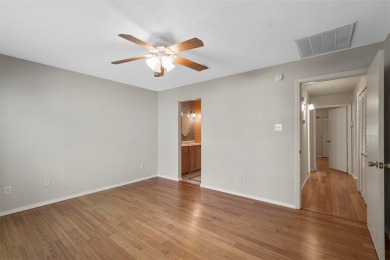 Discover the charm of this beautiful 2BR, 2BA corner condo with on Stevens Park Golf Course in Texas - for sale on GolfHomes.com, golf home, golf lot