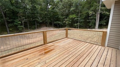 Needs paint, flooring and light deferred maintenance. Short sale on Bella Vista - Metfield Golf Complex and Country Club in Arkansas - for sale on GolfHomes.com, golf home, golf lot
