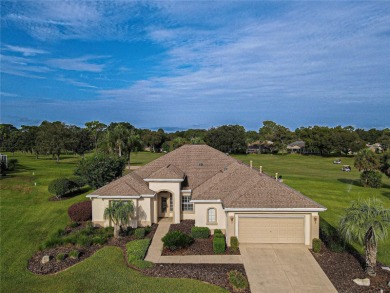 GOLF COURSE WITH GREAT VIEWS AND A STUNNING HOME LOCATED ON A on Eagle Ridge At Spruce Creek Country Club in Florida - for sale on GolfHomes.com, golf home, golf lot