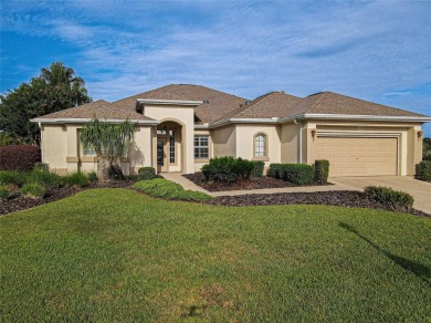 GOLF COURSE WITH GREAT VIEWS AND A STUNNING HOME LOCATED ON A on Eagle Ridge At Spruce Creek Country Club in Florida - for sale on GolfHomes.com, golf home, golf lot