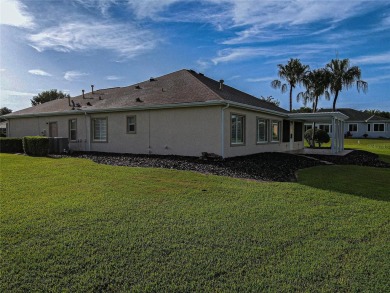 GOLF COURSE WITH GREAT VIEWS AND A STUNNING HOME LOCATED ON A on Eagle Ridge At Spruce Creek Country Club in Florida - for sale on GolfHomes.com, golf home, golf lot