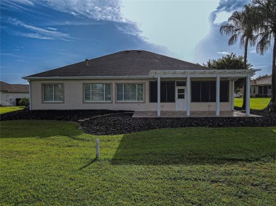 GOLF COURSE WITH GREAT VIEWS AND A STUNNING HOME LOCATED ON A on Eagle Ridge At Spruce Creek Country Club in Florida - for sale on GolfHomes.com, golf home, golf lot