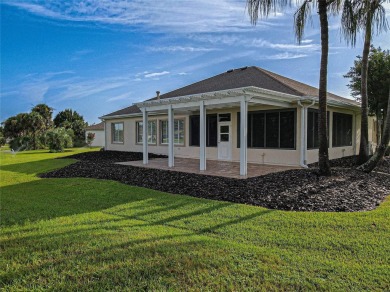 GOLF COURSE WITH GREAT VIEWS AND A STUNNING HOME LOCATED ON A on Eagle Ridge At Spruce Creek Country Club in Florida - for sale on GolfHomes.com, golf home, golf lot