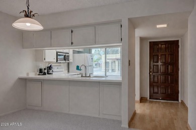 Located in the gated 55+ community of Fountain of the Sun, this on Fountain of the Sun Country Club in Arizona - for sale on GolfHomes.com, golf home, golf lot