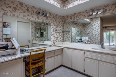 Located in the gated 55+ community of Fountain of the Sun, this on Fountain of the Sun Country Club in Arizona - for sale on GolfHomes.com, golf home, golf lot