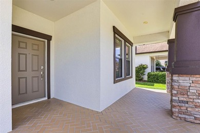 Images have been virtually staged for illustrative purposes on The Groves Golf and Country Club in Florida - for sale on GolfHomes.com, golf home, golf lot