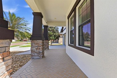 Images have been virtually staged for illustrative purposes on The Groves Golf and Country Club in Florida - for sale on GolfHomes.com, golf home, golf lot