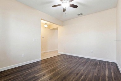 Images have been virtually staged for illustrative purposes on The Groves Golf and Country Club in Florida - for sale on GolfHomes.com, golf home, golf lot