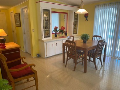 Fully furnished 2/2 home in vibrant 55+ community on leased land on Spanish Lakes Fairways in Florida - for sale on GolfHomes.com, golf home, golf lot