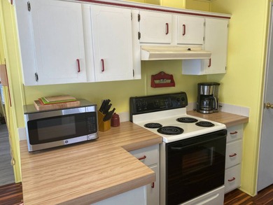 Fully furnished 2/2 home in vibrant 55+ community on leased land on Spanish Lakes Fairways in Florida - for sale on GolfHomes.com, golf home, golf lot