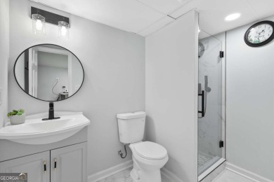 Welcome to this beautifully updated luxurious 4-bedroom, 3 on Brookstone Golf and Country Club in Georgia - for sale on GolfHomes.com, golf home, golf lot