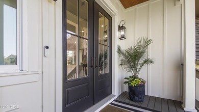 Experience waterfront living in Bay Point with front-row seats on Bay Point Resort Golf Club in Florida - for sale on GolfHomes.com, golf home, golf lot