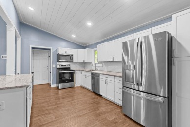 Welcome to this charming 4-bedroom, 2-bathroom home tucked away on Golf Club At Wescott Plantation in South Carolina - for sale on GolfHomes.com, golf home, golf lot