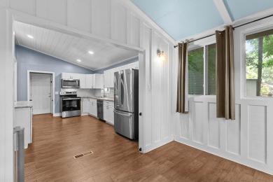 Welcome to this charming 4-bedroom, 2-bathroom home tucked away on Golf Club At Wescott Plantation in South Carolina - for sale on GolfHomes.com, golf home, golf lot