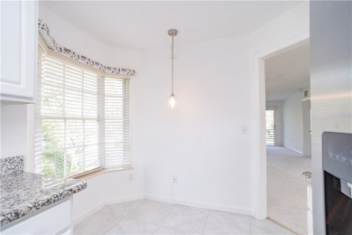 All age community. 2nd floor unit with pond water views. New AC on The American Golf Club in Florida - for sale on GolfHomes.com, golf home, golf lot