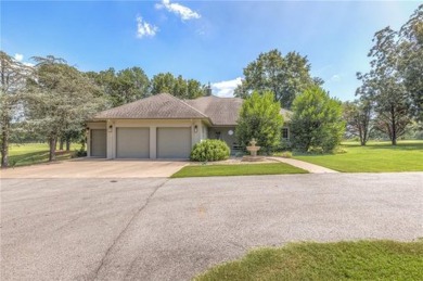 Welcome to your dream home nestled on the greens of the Cherokee on Cherry Springs Golf Club in Oklahoma - for sale on GolfHomes.com, golf home, golf lot