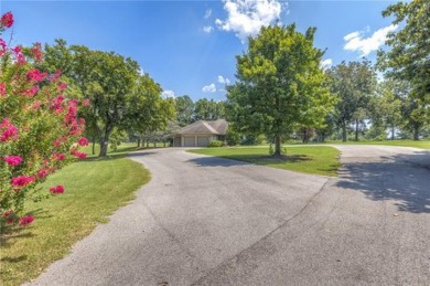 Welcome to your dream home nestled on the greens of the Cherokee on Cherry Springs Golf Club in Oklahoma - for sale on GolfHomes.com, golf home, golf lot