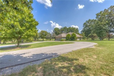 Welcome to your dream home nestled on the greens of the Cherokee on Cherry Springs Golf Club in Oklahoma - for sale on GolfHomes.com, golf home, golf lot