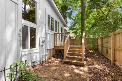 Welcome to this charming 4-bedroom, 2-bathroom home tucked away on Golf Club At Wescott Plantation in South Carolina - for sale on GolfHomes.com, golf home, golf lot