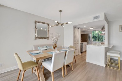 Captivating lakefront and golf views await in this spacious on Boca West Golf and Country Club in Florida - for sale on GolfHomes.com, golf home, golf lot
