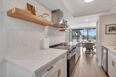 Captivating lakefront and golf views await in this spacious on Boca West Golf and Country Club in Florida - for sale on GolfHomes.com, golf home, golf lot
