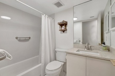 Captivating lakefront and golf views await in this spacious on Boca West Golf and Country Club in Florida - for sale on GolfHomes.com, golf home, golf lot
