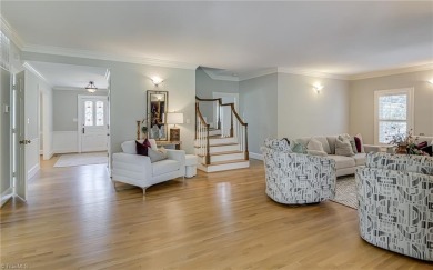 Classic white brick beauty nestled on the 16th fairway of Forest on Forest Oaks Country Club in North Carolina - for sale on GolfHomes.com, golf home, golf lot