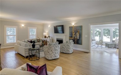 Classic white brick beauty nestled on the 16th fairway of Forest on Forest Oaks Country Club in North Carolina - for sale on GolfHomes.com, golf home, golf lot