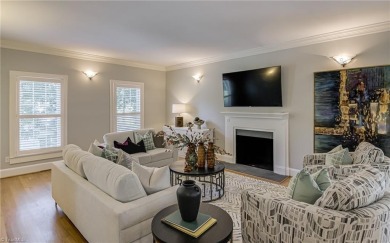 Classic white brick beauty nestled on the 16th fairway of Forest on Forest Oaks Country Club in North Carolina - for sale on GolfHomes.com, golf home, golf lot