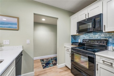 This condo has been totally updated new kitchen, new flooring on Vista Plantation Golf Club in Florida - for sale on GolfHomes.com, golf home, golf lot
