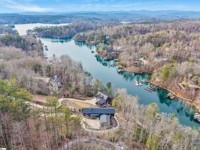 Lake & mountain views set the tone for this exceptional newly on The Reserve At Lake Keowee in South Carolina - for sale on GolfHomes.com, golf home, golf lot