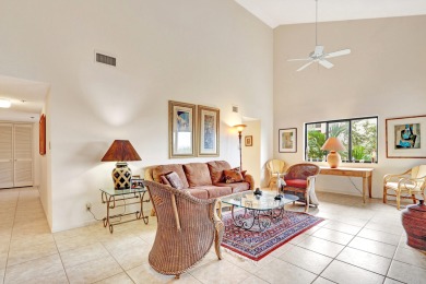 Large corner unit with a spacious screened lanai overlooking a on Jupiter Dunes Golf Course in Florida - for sale on GolfHomes.com, golf home, golf lot