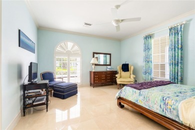 West Indies-inspired 3BR/3.5BA estate on .62 acres overlooking on Orchid Island Golf and Beach Club in Florida - for sale on GolfHomes.com, golf home, golf lot