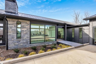 Lake & mountain views set the tone for this exceptional newly on The Reserve At Lake Keowee in South Carolina - for sale on GolfHomes.com, golf home, golf lot