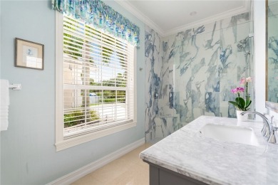 West Indies-inspired 3BR/3.5BA estate on .62 acres overlooking on Orchid Island Golf and Beach Club in Florida - for sale on GolfHomes.com, golf home, golf lot
