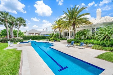 West Indies-inspired 3BR/3.5BA estate on .62 acres overlooking on Orchid Island Golf and Beach Club in Florida - for sale on GolfHomes.com, golf home, golf lot