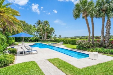 West Indies-inspired 3BR/3.5BA estate on .62 acres overlooking on Orchid Island Golf and Beach Club in Florida - for sale on GolfHomes.com, golf home, golf lot