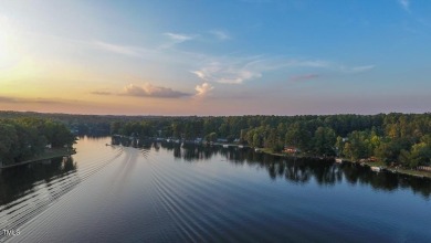 LET THE FUN BEGIN !!  This is a must see !! A cozy getaway at on River Golf and County Club at Lake Royale in North Carolina - for sale on GolfHomes.com, golf home, golf lot