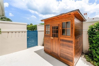 West Indies-inspired 3BR/3.5BA estate on .62 acres overlooking on Orchid Island Golf and Beach Club in Florida - for sale on GolfHomes.com, golf home, golf lot