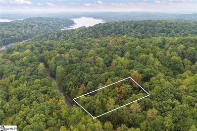 Discover the perfect blend of privacy and community living with on The Trail At Chickasaw Pointe in South Carolina - for sale on GolfHomes.com, golf home, golf lot