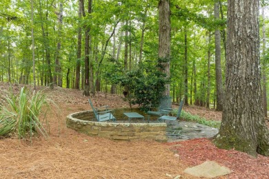 Nestled just off a cul-de-sac on this wooded lot in Reynolds on Reynolds Lake Oconee - The Oconee in Georgia - for sale on GolfHomes.com, golf home, golf lot