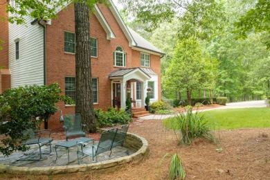 Nestled just off a cul-de-sac on this wooded lot in Reynolds on Reynolds Lake Oconee - The Oconee in Georgia - for sale on GolfHomes.com, golf home, golf lot