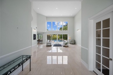 Located in  Palm Beach Polo community, this stunning 4-bedroom on Palm Beach Polo and Country Club in Florida - for sale on GolfHomes.com, golf home, golf lot