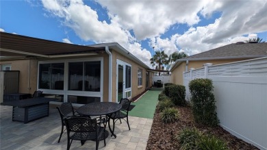 This charming 2-bedroom, 2-bathroom courtyard villa offers 1,132 on The Links of Spruce Creek in Florida - for sale on GolfHomes.com, golf home, golf lot