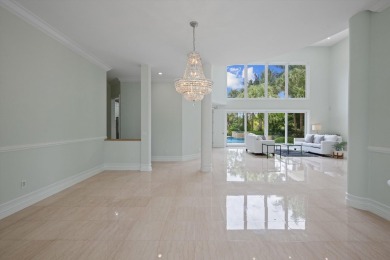 Located in  Palm Beach Polo community, this stunning 4-bedroom on Palm Beach Polo and Country Club in Florida - for sale on GolfHomes.com, golf home, golf lot