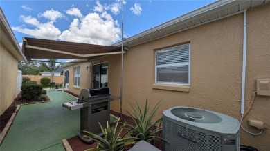 This charming 2-bedroom, 2-bathroom courtyard villa offers 1,132 on The Links of Spruce Creek in Florida - for sale on GolfHomes.com, golf home, golf lot